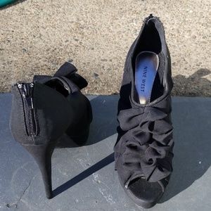 Ruffled black heels